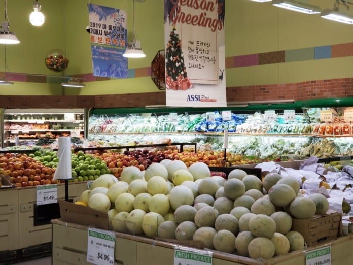 A variety of fruit on display in a store

Description automatically generated